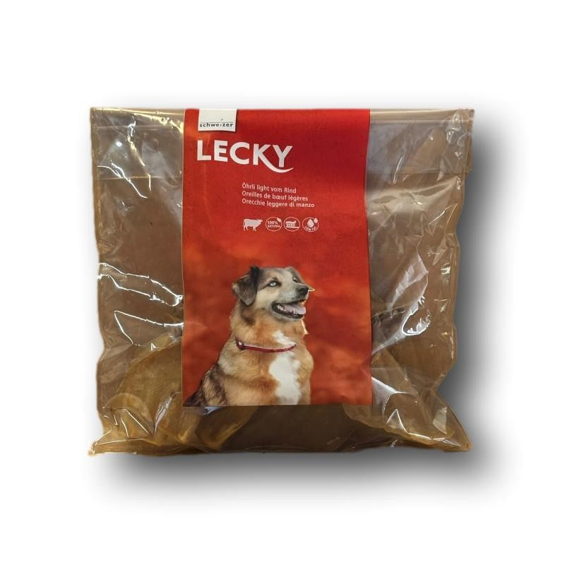 Lecky Oehrli light vom Rind, verpackt in transparenter Tüte, mit Abbildung eines glücklichen Hundes und rotem Etikett, geeignet als fettarmer Hundesnack zur Zahnreinigung.